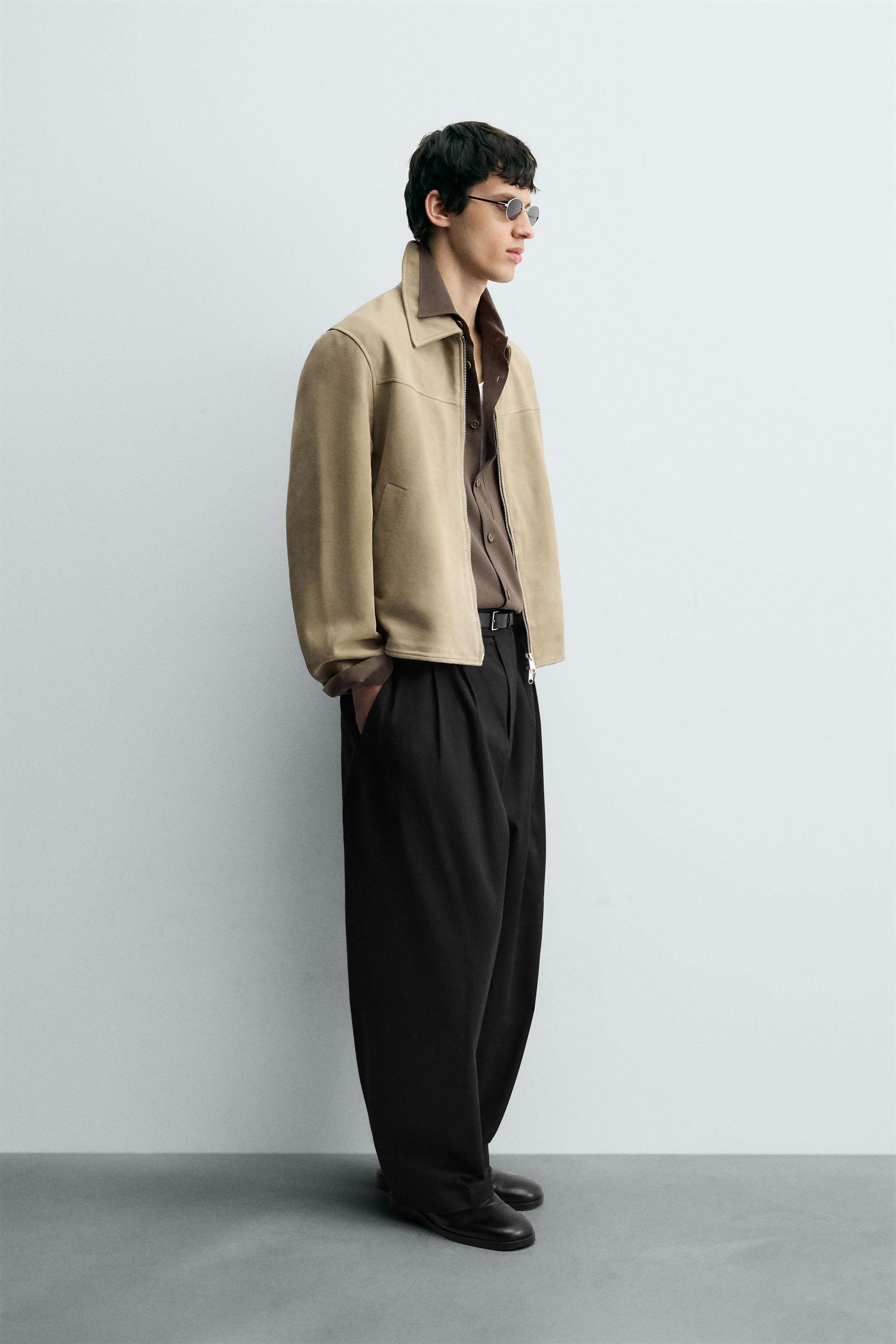 RELAXED FIT PLEATED PANTS